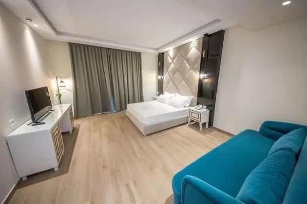 Deluxe Üç Kişilik Oda, Balkon, Kısmi Deniz Manzaralı