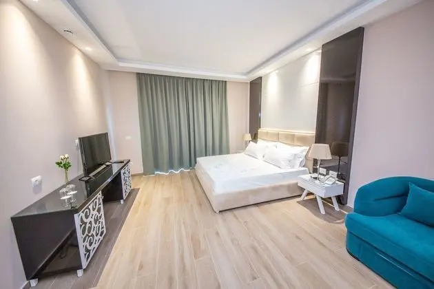 Deluxe Üç Kişilik Oda, Balkon, Kısmi Deniz Manzaralı