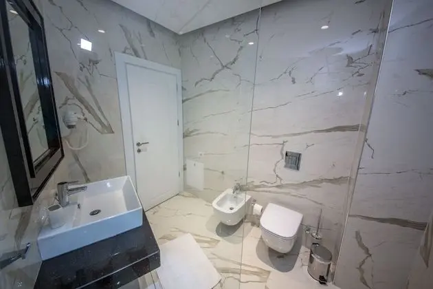 Deluxe Üç Kişilik Oda, Balkon, Kısmi Deniz Manzaralı