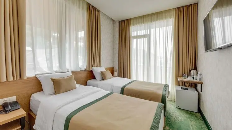 Economy Tek Büyük veya İki Ayrı Yataklı Oda