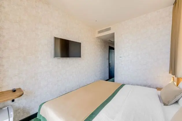 Economy Tek Büyük veya İki Ayrı Yataklı Oda