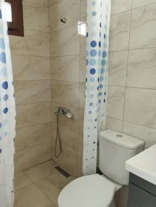 Standart Üç Kişilik Oda,Bahçe Manzaralı