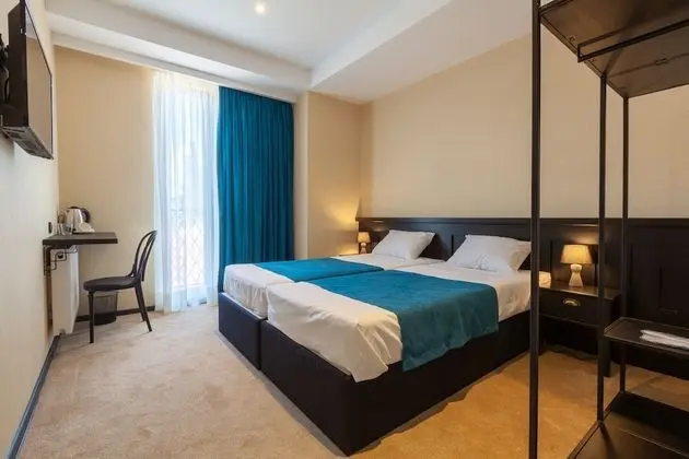 Comfort Tek Büyük veya İki Ayrı Yataklı Oda