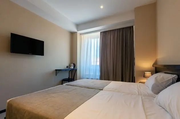 Comfort Tek Büyük veya İki Ayrı Yataklı Oda