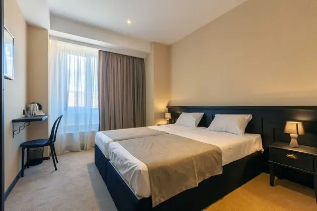 Comfort Tek Büyük veya İki Ayrı Yataklı Oda