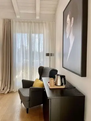 Tek Büyük veya İki Ayrı Yataklı Oda, Bahçe Manzaralı