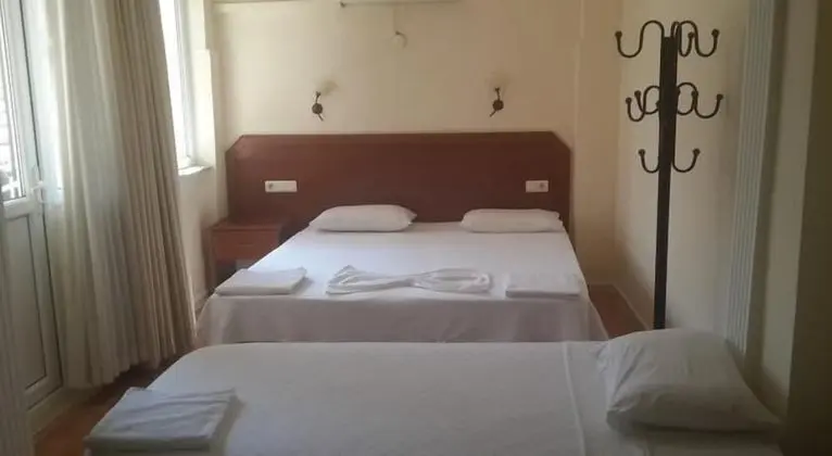 Üç Kişilik Oda