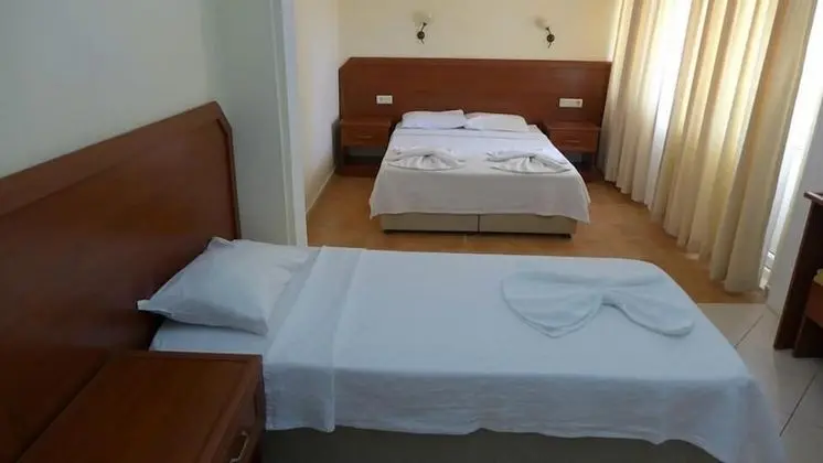 Üç Kişilik Oda