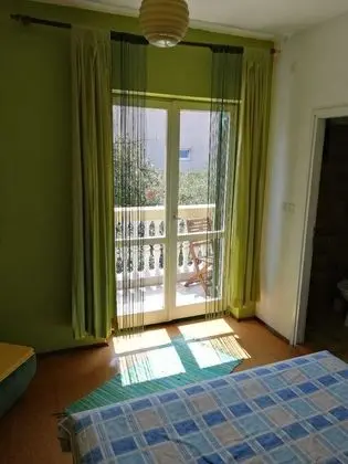 Basic Tek Büyük veya İki Ayrı Yataklı Oda