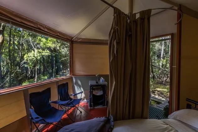 2 Nights - Boutique Camp Hut on Exclusive Island, All Inclusive with Private Return Flights
