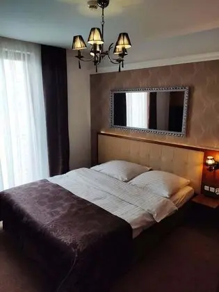 Basic Tek Büyük veya İki Ayrı Yataklı Oda