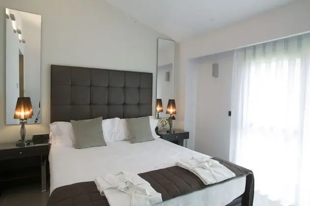 Tek Büyük veya İki Ayrı Yataklı Oda, Bahçe Manzaralı