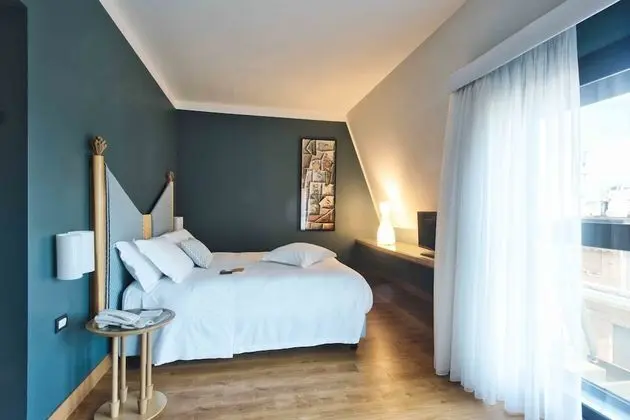 Deluxe Tek Büyük veya İki Ayrı Yataklı Oda (Top Floor)