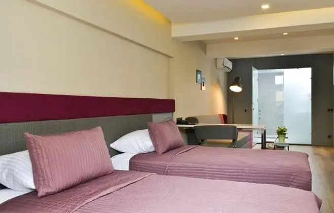 Deluxe Tek Büyük veya İki Ayrı Yataklı Oda