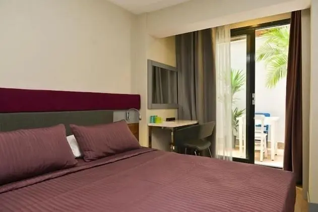 Deluxe Tek Büyük veya İki Ayrı Yataklı Oda
