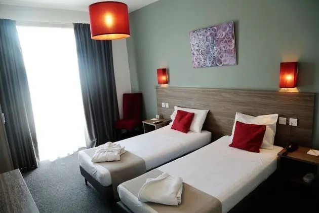 Deluxe Tek Büyük veya İki Ayrı Yataklı Oda