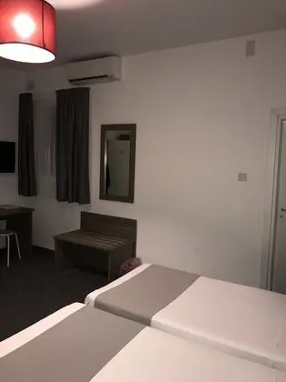 Economy Tek Büyük veya İki Ayrı Yataklı Oda