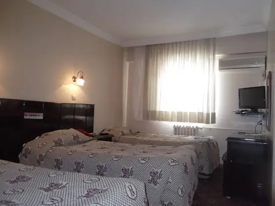 Üç Kişilik Oda
