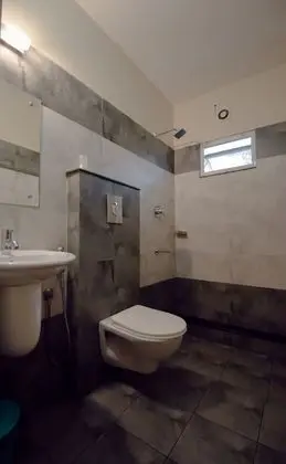 Deluxe Tek Büyük veya İki Ayrı Yataklı Oda (AC)
