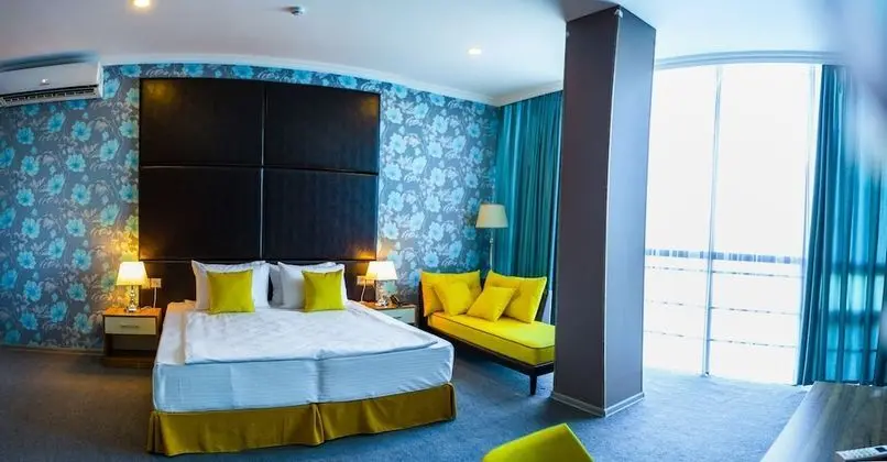 Deluxe Tek Büyük veya İki Ayrı Yataklı Oda