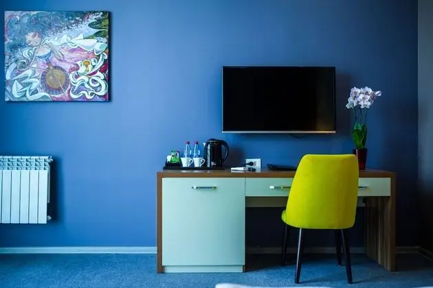 Deluxe Tek Büyük veya İki Ayrı Yataklı Oda