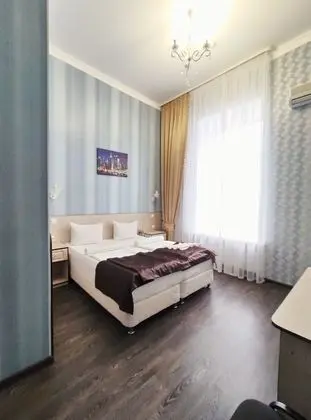 Classic Tek Büyük veya İki Ayrı Yataklı Oda