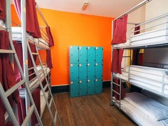 Bed in 12 Bed Dorm with Shared Bathroom (Triple Bunks)