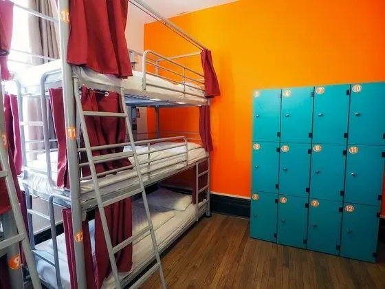Bed in 12 Bed Dorm with Shared Bathroom (Triple Bunks)