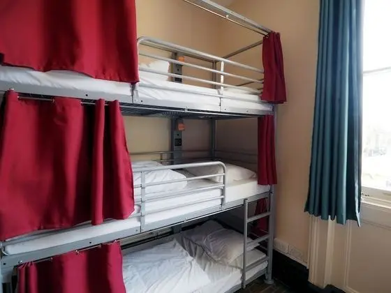 Bed in 12 Bed Dorm with Shared Bathroom (Triple Bunks)