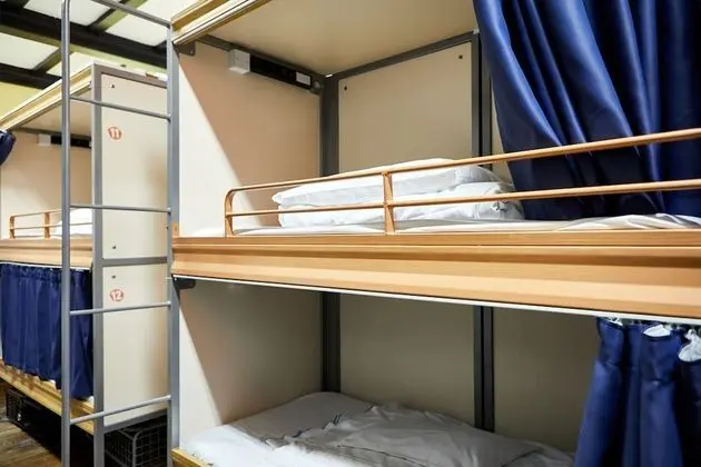 Bed in 18 Pod Dorm with Shared Bathroom