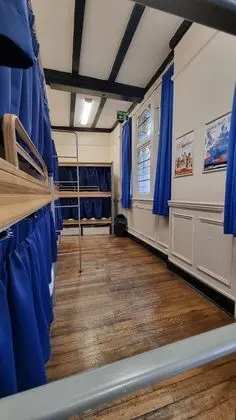 Bed in 18 Pod Dorm with Shared Bathroom