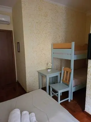 Üç Kişilik Oda