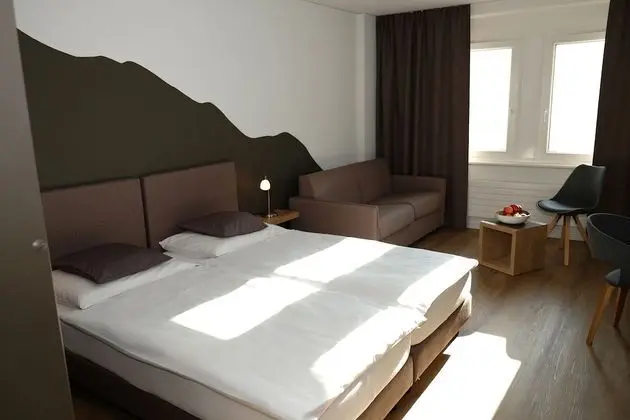 Superior Tek Büyük veya İki Ayrı Yataklı Oda (Double Bed & Sofa)