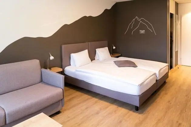 Superior Tek Büyük veya İki Ayrı Yataklı Oda (Double Bed & Sofa)