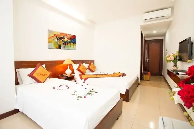 Deluxe Üç Kişilik Oda, Kısmi Deniz Manzarası