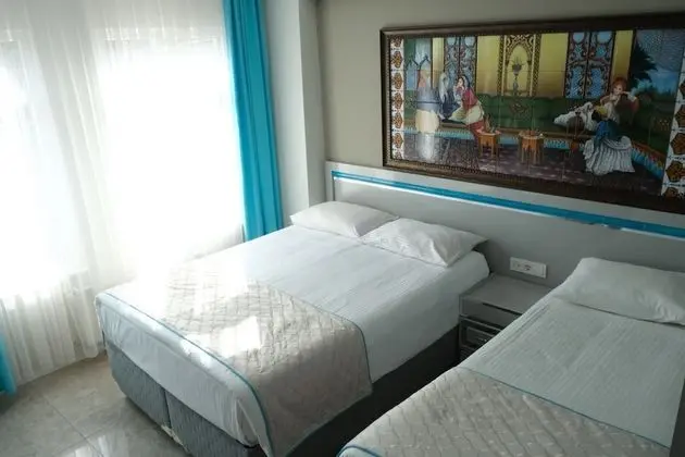 Üç Kişilik Oda