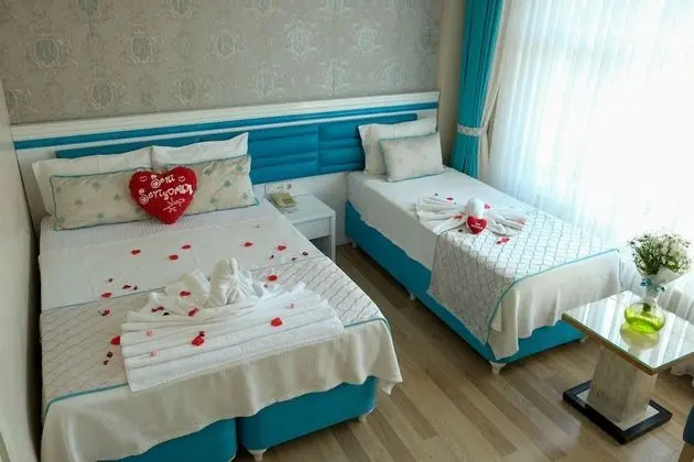 Üç Kişilik Oda