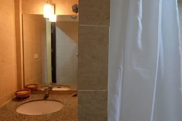 Standard Room with Shared Bathroom