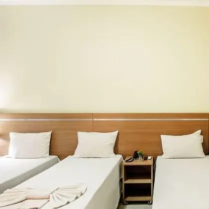 Üç Kişilik Oda (3 camas de solteiro)