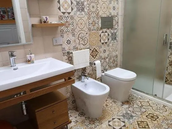 Superior Tek Büyük veya İki Ayrı Yataklı Oda (Arancione)