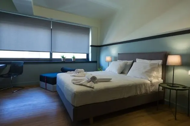 Deluxe Tek Büyük veya İki Ayrı Yataklı Oda