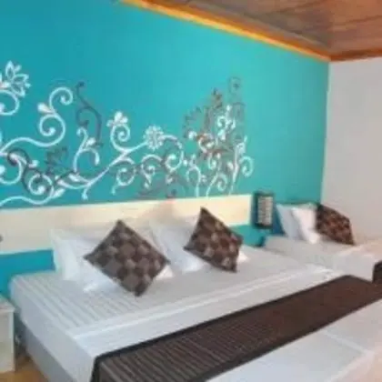Deluxe Triple Room with Garden View