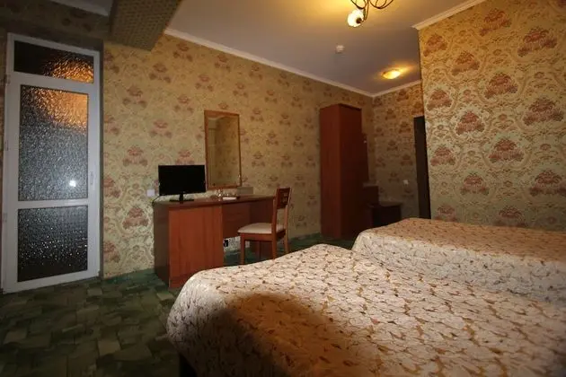 Economy Tek Büyük veya İki Ayrı Yataklı Oda