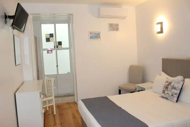 Quarto Duplo com Cama Extra