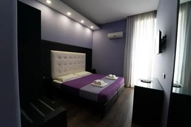 Business Tek Büyük veya İki Ayrı Yataklı Oda
