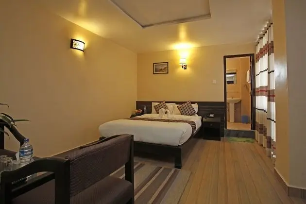 Deluxe Tek Büyük veya İki Ayrı Yataklı Oda
