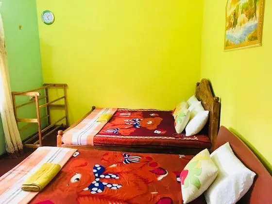 Deluxe Üç Kişilik Oda, Birden Çok Yatak, Sigara İçilebilir, Bahçe Manzaralı