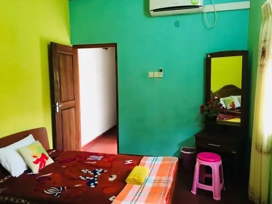 Deluxe Üç Kişilik Oda, Birden Çok Yatak, Sigara İçilebilir, Bahçe Manzaralı