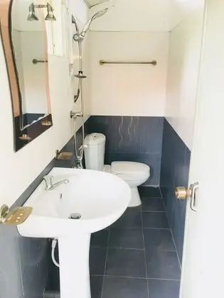 Deluxe Üç Kişilik Oda, Birden Çok Yatak, Sigara İçilebilir, Bahçe Manzaralı
