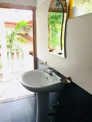 Deluxe Üç Kişilik Oda, Birden Çok Yatak, Sigara İçilebilir, Bahçe Manzaralı